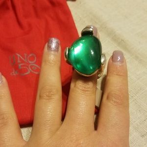 Silver and green ring